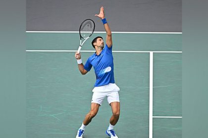 Novak Djokovic makes winning start in title defence at Paris Masters