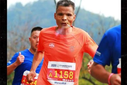 Chinese grandpa finishes marathon while chain smoking cigarettes