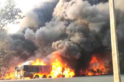 A chemical-laden lorry catches fire after collision between another lorry