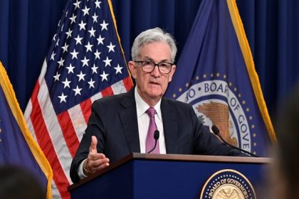 US: Fed approves quarter-point hike, indicating improved inflation outlook
