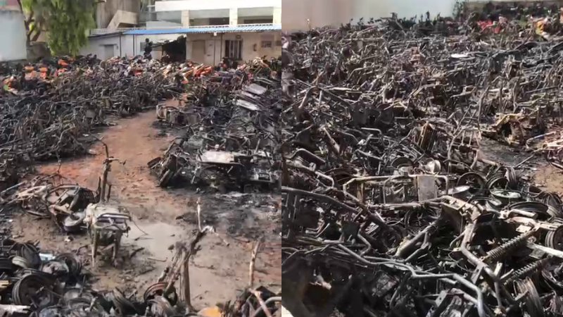 Over 400 electric two-wheelers charred in fire at parking yard in Kalkere